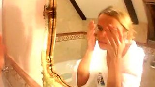 Hot babe with perfect big boobs taking shower