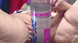 Big Bottle Plugged Clit Cunt