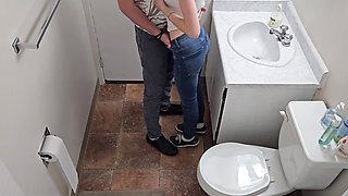 Skinny brunette gets fucked from behind in standing pose – toilet quickie