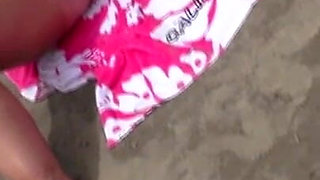 Wife masturbates on beach