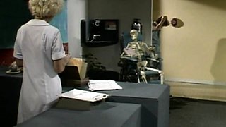 A super sexy brunette massages her big boobs