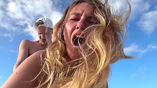 Stunning blonde gets fucked by a big cock boyfriend on the public beach