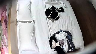 Cute amateur asian web cam girl playing with her toy