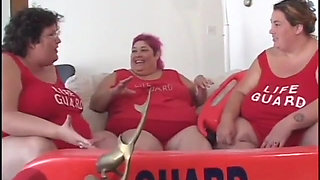 Fat bellied chick in red uniform rides one long stick