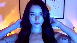 Cute babe in sexy lingerie masturbates with her pink dildo