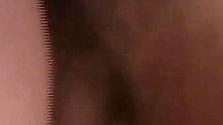 She Lies Naked on the Beach While He Watches Her