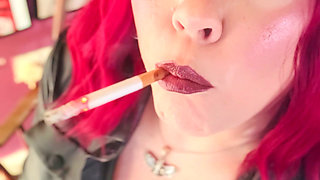 Your Mistress Tina Snua Dressed in Leather Chain Smoking 2 Cork Cigarettes