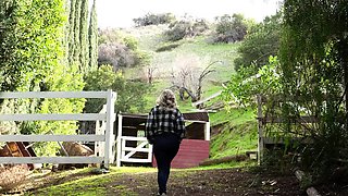 Blonde is flashing her big boobs in the outdoors