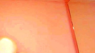 Amateur young brunette enjoys dildo on solo masturbation