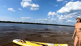 Big-Ass Blonde's Naked Walk on a Paddleboard