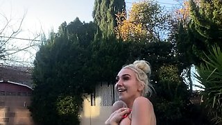 Blonde is flashing her big boobs in the outdoors