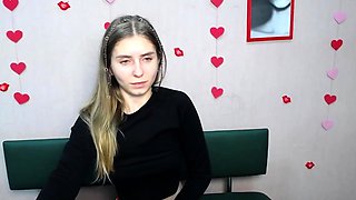 Young Ukrainian blonde in red panties posing on webcam show