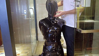 Mz20 - the Girl in Latex Clothing Locked in a Glass Room