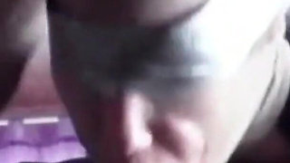 Second View of a MILF Hooded in Nylon, Blindfolded with Duct Tape, Facialized, and Cummed in Mouth