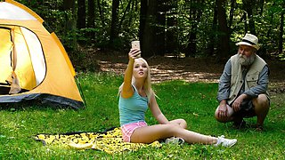 Young Lovita pleases her silver fox in the great outdoors