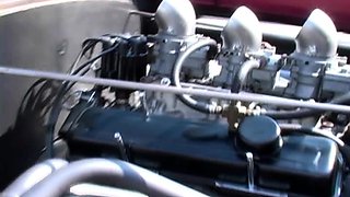 Brunette babe with fake big boobs fucks in the car
