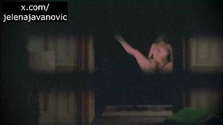 Spy Blonde Woman at the window