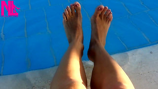 Barefoot Dangling in Swimming Pool Water