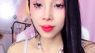 Sexy webcam bitch fucks her ass with a sex toy