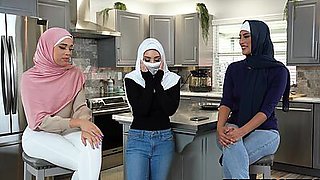 Shy Arab girl introduced to American cock by her two hijab girlfriends
