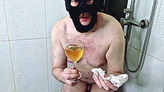 Piss games. Dominatrix Nika pees in a glass, then lets him smell her panties and lets the slave drink the entire glass to the la