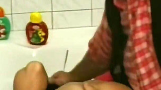 Busty Mature Brunette Takes Deep Anal in Bathroom