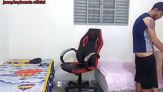Stepsister changes near her stepbrother and he ends up fucking her on the gaming chair