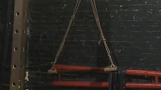 Bondage seance with submissive Olivia in catsuit