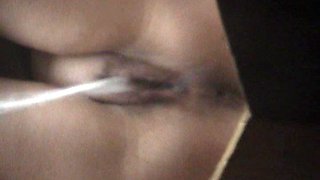 amateur beauty with shaved pussy is pissing in the toilet