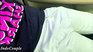 A Hot and Sexy Hijab-wearing Student's Wife Invited Him From a Jakarta University. She Played with My Cock Beside the Car