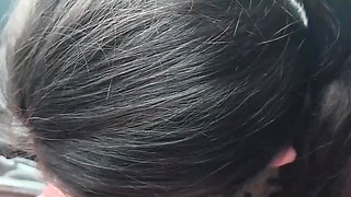 Brunette girl blew her boyfriend in the car and both enjoyed it POV