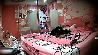 Cute amateur asian web cam girl playing with her toy