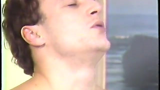 Redhead masturbates in bed with banana in vintage porn