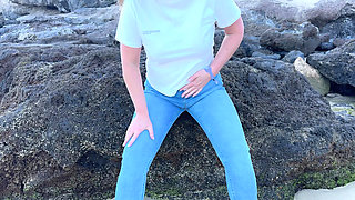 Peeing in Tight Jeans on the Beach