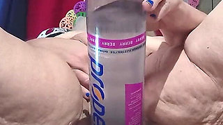 Big Bottle Plugged Clit Cunt