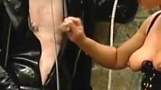 Guy in latex dress humiliated in the garden