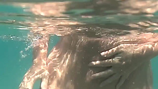 Naked MILF Swimming with Anal Plug Underwater