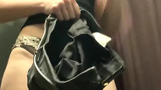 Hot MILF Masturbates in the Fitting Room of the Store