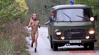 A Blonde Imprisoned Girl Has to Run Beside the Police Bus Leashed and Driven by Lashes