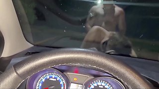 Masked milf gets fucked on a car hood, where her husband sits in there and films it