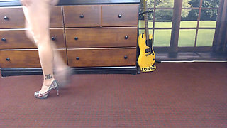 Walking in gray plaid pumps