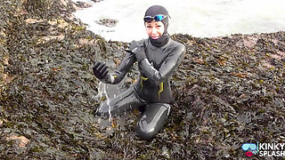 Rubbery Beach Encounter: Lucy's Neoprene Pussy Play with Stranger