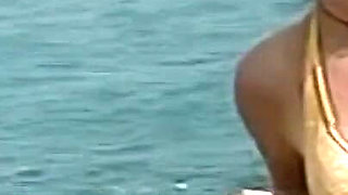 Horny Redhead Babe Fingers Pussy on Wild Beach