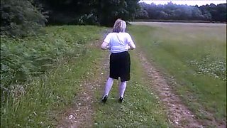 Blonde is flashing her big boobs in the outdoors