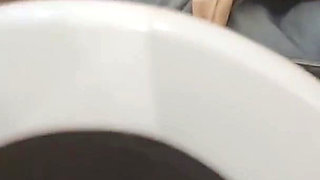 Pissing Woman in the Toilet