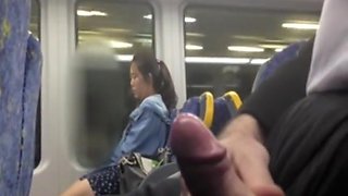 Chinese girl looking at my cock at the bus