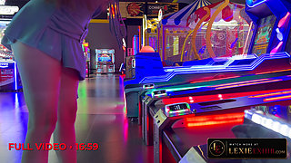 Flashing my butt plug and pussy while playing games at the arcade