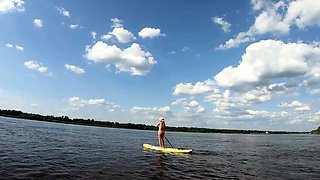 Big-Ass Blonde's Naked Walk on a Paddleboard