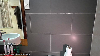 Fucking a cute 18yo Thai teen in the bathroom and cumming on her face