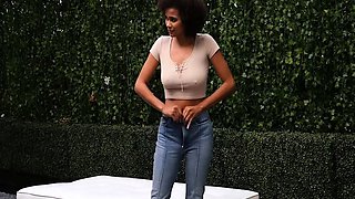 Brunette seductress working her big boobs and hot ass